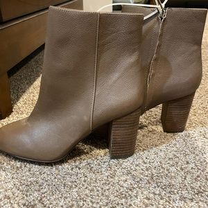 Brand new lighter brown boots.